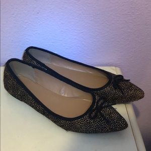 Banana republic black and brown spotted flats .